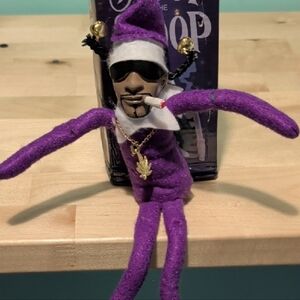 Snoop On The Stop. He Has Little Bella On His Hair